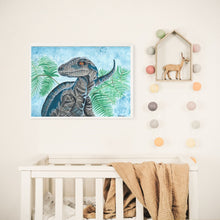 Load image into Gallery viewer, This Raptor is a print of my beautiful original watercolour painting. I have used quality watercolour paint on 100 percent cotton watercolour paper to create the original piece. This dinosaur is the perfect edition to any dinosaur lovers room. You have the option of a beautiful soft blue or white background.
