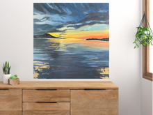 Load image into Gallery viewer, ‘Sunset Reflections’ is an original acrylic stretched canvas painting, measuring 76cm x 76cm. Inspired by the beautiful beaches of Australia, Toni has painted this stunning piece. A mixture of dark blues for the ocean and vibrant orange and yellows for the sunset, this painting has it all. Toni has used impasto to create a textured, protruding feeling to certain elements of the painting. The beautiful addition of gold leaf has given the painting a shimmery element.