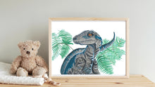 Load image into Gallery viewer, This Raptor is a print of my beautiful original watercolour painting. I have used quality watercolour paint on 100 percent cotton watercolour paper to create the original piece. This dinosaur is the perfect edition to any dinosaur lovers room. You have the option of a beautiful soft blue or white background.
